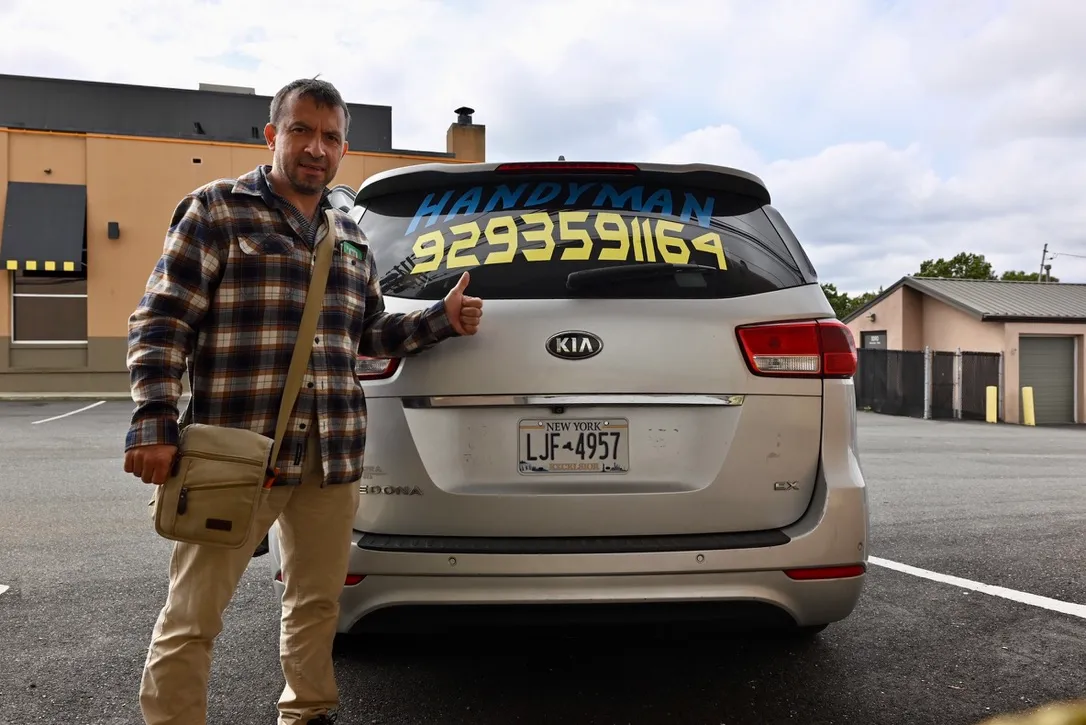 Olexandr, your Handy A to Z handyman, next to his branded van